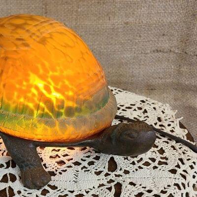 Tiffany style amber color glass shell Turtle lamp with metal base.