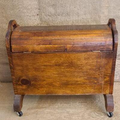 Vintage wood craft chest on wheels. 