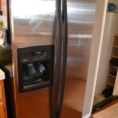 LOT 73  WHIRLPOOL SIDE BY SIDE STAINLESS STEEL REFRIGERATOR 