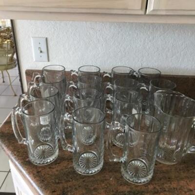 14 large glass beer mugs with handles and one glass pitcher with handles YD#022-0083