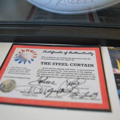 LOT 99  SIGNED STEELERS STEEL CURTAIN SIGNED BALL WITH CERTIFICATE OF AUTHENTICITY