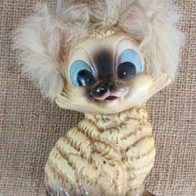 Adorable vintage cat figurine bank with natural fur accents. 1951