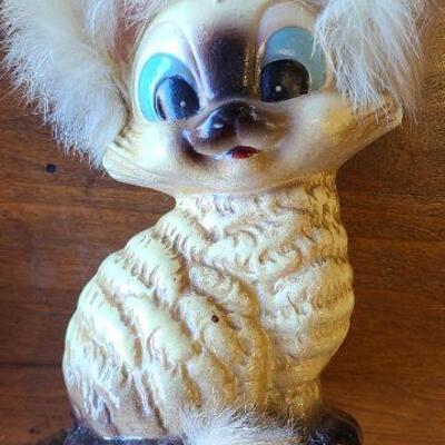 Adorable vintage cat figurine bank with natural fur accents. 1951