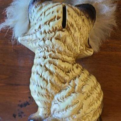 Adorable vintage cat figurine bank with natural fur accents. 1951