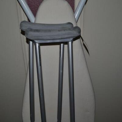 LOT 140  IRONING BOARD AND CRUTCHES