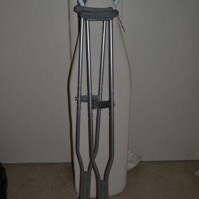 LOT 140  IRONING BOARD AND CRUTCHES