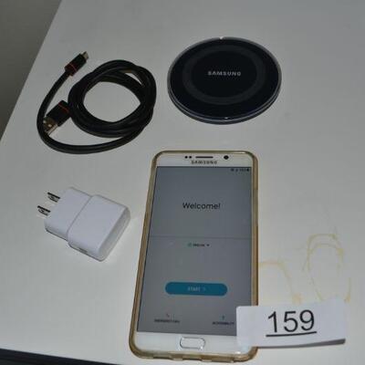 LOT 159  SAMSUNG PHONE AND CHARGER