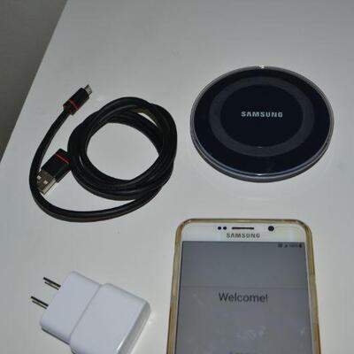 LOT 159  SAMSUNG PHONE AND CHARGER