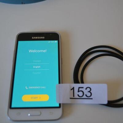 LOT 153 SAMSUNG PHONE AND CHARGER