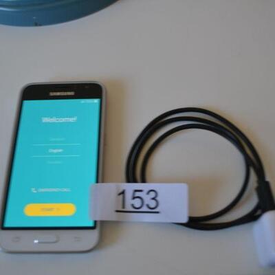 LOT 153 SAMSUNG PHONE AND CHARGER