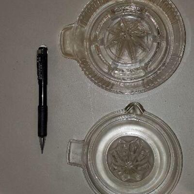 2 Vintage clear glass juicers (item #58)