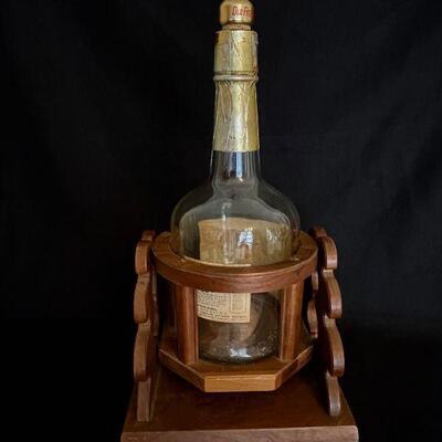 HUGE VINTAGE â€œOLD FITZGERALDâ€ WELLER BOURBON BOTTLE & CRADLE