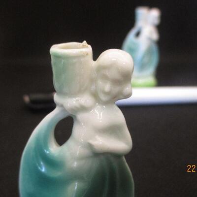 Lot 9 - Two Miniature Girls Candle Holders