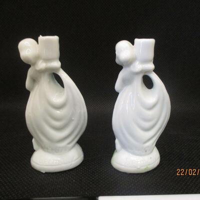 Lot 9 - Two Miniature Girls Candle Holders