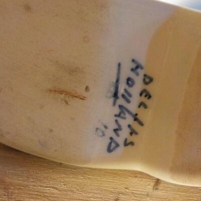 "Original Delft signed by Eleson Amsterdam."