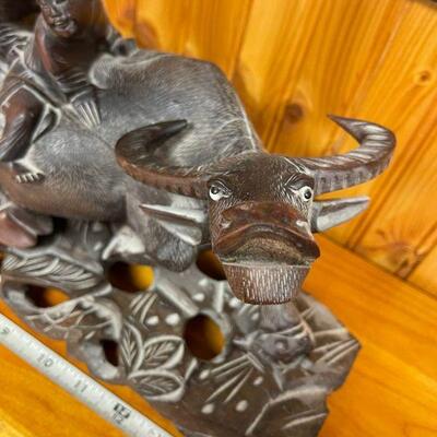 Hand carved  wooden Yack / water Buffalo with riders 