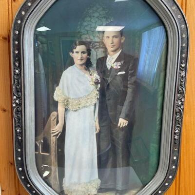Antique framed picture of young married couple 