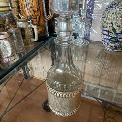 Vintage decanter with metal body band