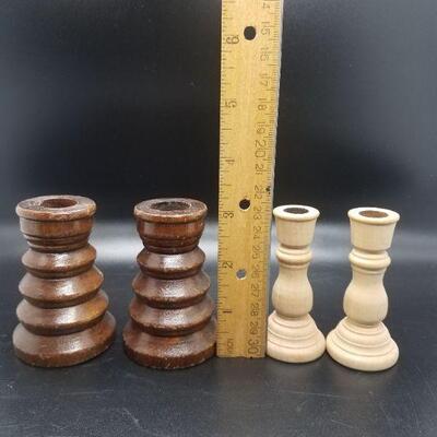 2 pairs of small wooden candlestick holders