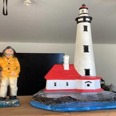 303 Small Cast Iron Sea Man Figurine and Ceramic Lighthouse 