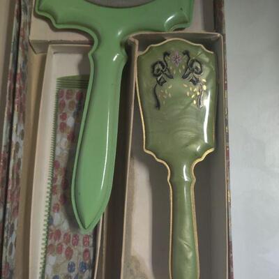 Vintage mirror and brush