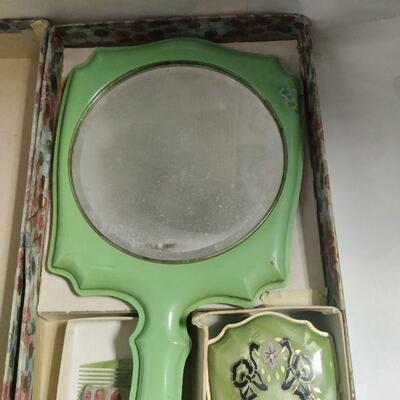 Vintage mirror and brush