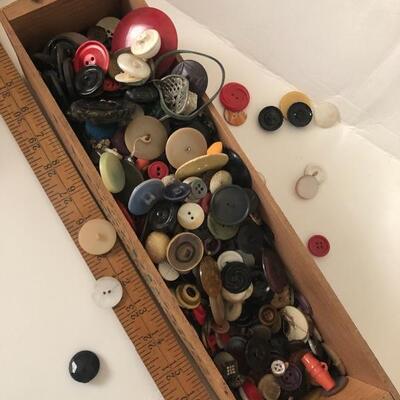 Unsorted box of buttons