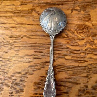 Ornate serving spoon 