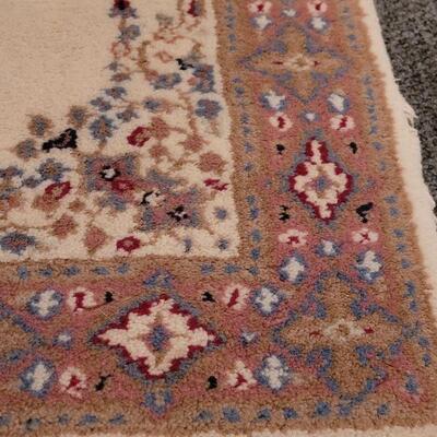 Lot 110: Wool Rug  56" Ã— 25.5"