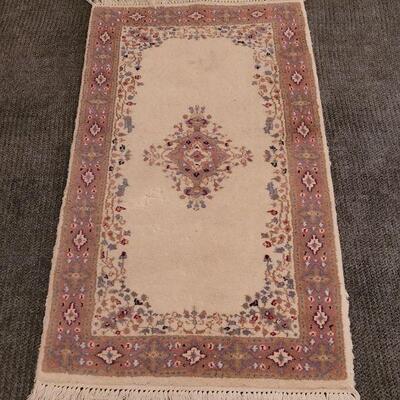 Lot 110: Wool Rug  56" Ã— 25.5"