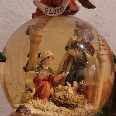 Lot 121: Vintage Musical Nativity Snow Globe with Circling Well Wishers 