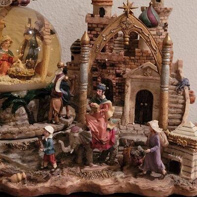 Lot 121: Vintage Musical Nativity Snow Globe with Circling Well Wishers 