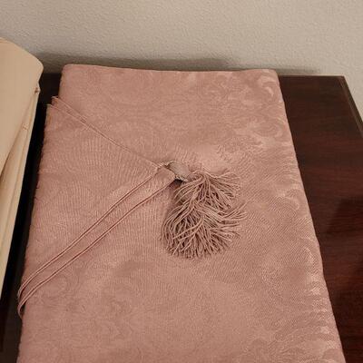 Lot 130:  Brown Lace, Pink Runner and Plastic Tablecloths 