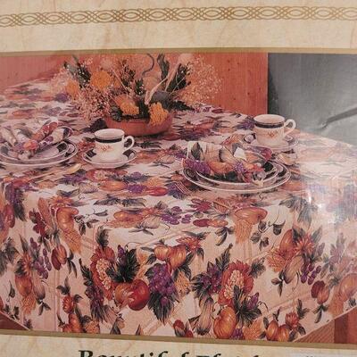 Lot 131: (2) New in Package Tablecloths - Fall and Dark Red