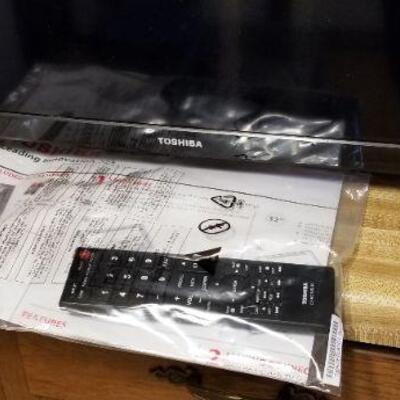 Lot #64  Toshiba Flat Screen TV - 28" with remote
