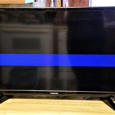 Lot #64  Toshiba Flat Screen TV - 28" with remote