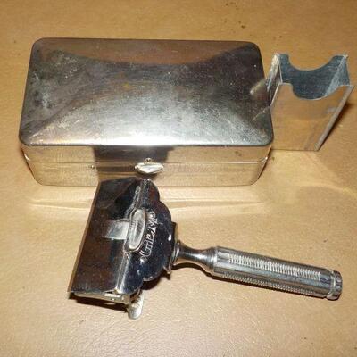 :"1940's Gem Travel Razor with case and blade holder".