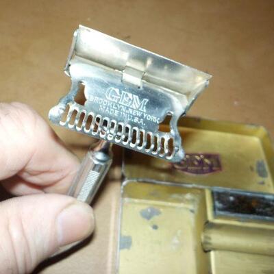 :"1940's Gem Travel Razor with case and blade holder".