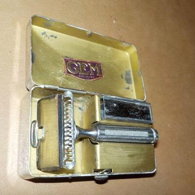 :"1940's Gem Travel Razor with case and blade holder".