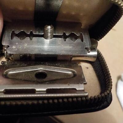" Gillette's MIni 1930's razor complete but small ."