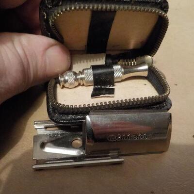 " Gillette's MIni 1930's razor complete but small ."