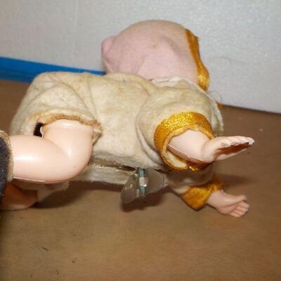 " 1920's wind up metal doll".