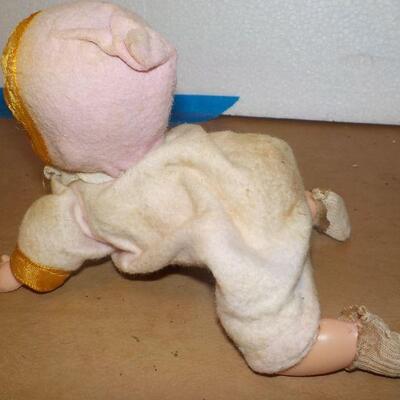 " 1920's wind up metal doll".