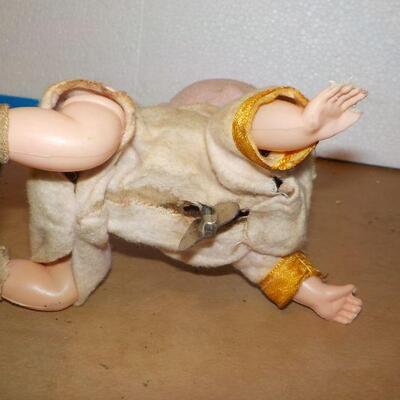 " 1920's wind up metal doll".