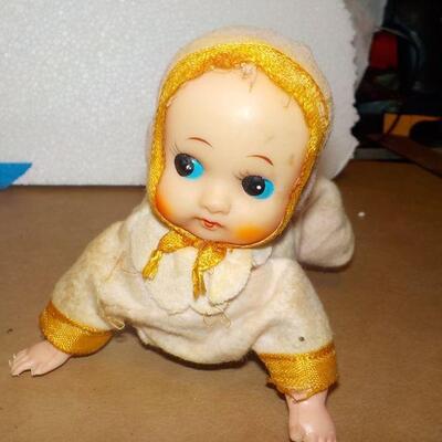 " 1920's wind up metal doll".