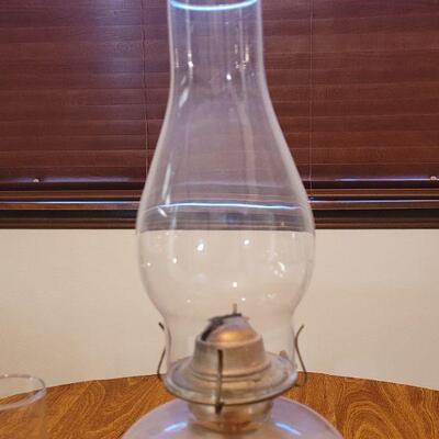 Lot 214: Oil Lamp and an extra Chimney 