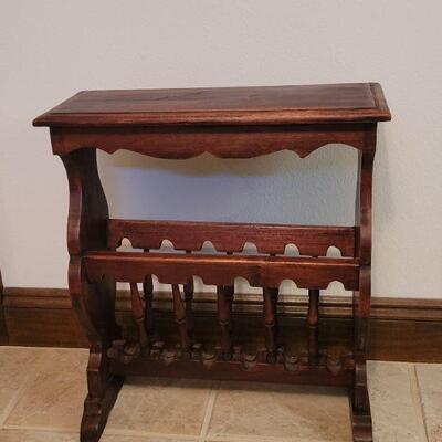Lot 217: Side Table Magazine Rack (has small place with damage on top)