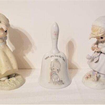 Lot #81  Two Precious Moments Figurines and a Precious Moments Bell