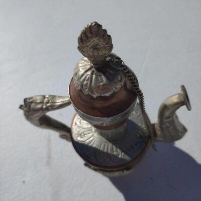 Small decorative metal teapot