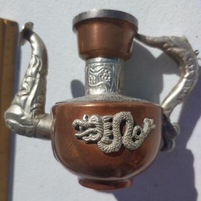 Small decorative metal teapot
